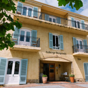 Provencal facade with blue shutters at Auberge Burgundy on Harbour Road, Hermanus