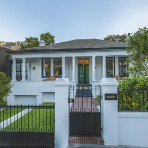 The white heritage villa and veranda of the Cape Cadogan Boutique Hotel in Gardens, Cape Town