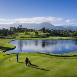 Fairways, a lake and the Outeniqua mountains on the Fancourt golf estate outside George