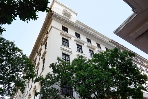 The white heritage facade of the Gorgeous George hotel on St Georges Mall in central Cape Town