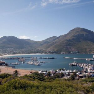 Hout Bay harbour and the fishing fleet enclosed by mountains on the Atlantic side of the peninsula