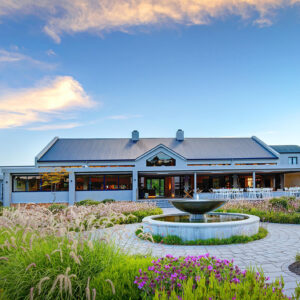 Main building, fountain and gardens at Knysna Hollow Country Estate