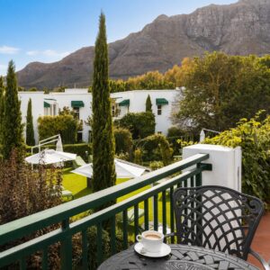 The white villas and cypress garden at Majeka House in Paradyskloof outside Stellenbosch