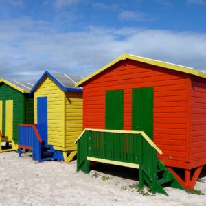 The brightly painted Victorian bathing boxes on the beach at Muizenberg