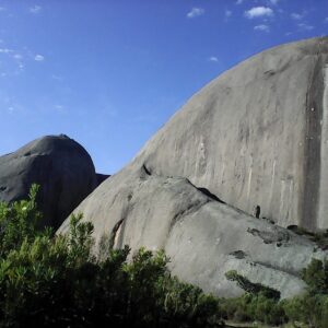 The bare granite dome of Paarl Rock rising out of fynbos on Paarl Mountain
