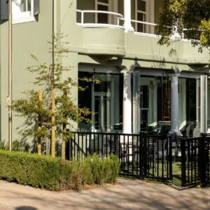 The street frontage of the Protea Hotel Franschhoek on Huguenot Road