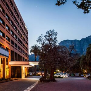 A street in a city with a building at Southern Sun Newlands in Cape Town
