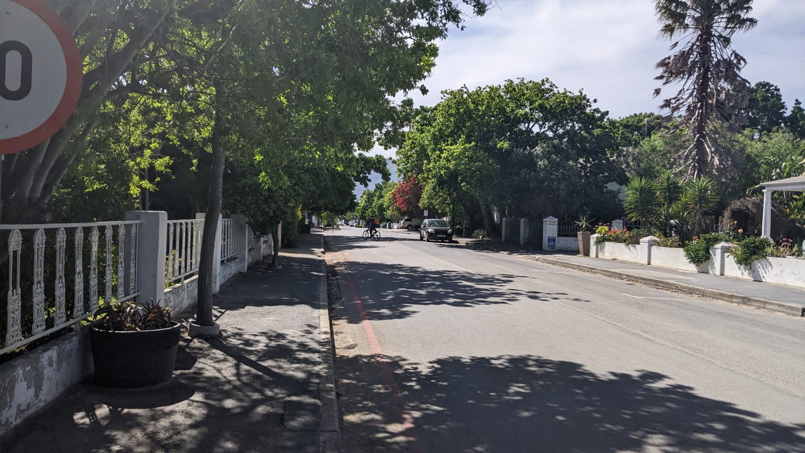 Oak-shaded Queen Victoria Street through the historic village of Stanford