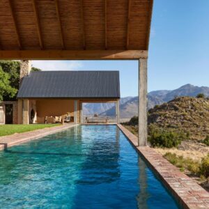 A swimming pool in the backyard of a house at 7 Koppies in Franschhoek