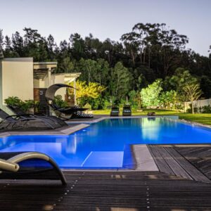 A swimming pool in the backyard of a house at A Riverbed Guesthouse in Swellendam