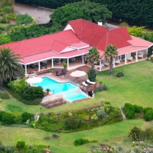 An aerial view of a house with a swimming pool at Bellavista in Gansbaai