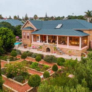 An aerial view of a house with a garden at Betty's Boutique Hotel in Mossel Bay