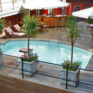 A swimming pool on the deck of a cruise ship at Cape Town Lodge Hotel in Cape Town