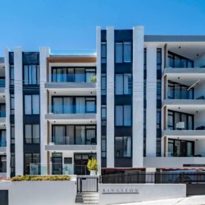 An apartment building with black and white balconies at Casa on Kei by Totalstay in Cape Town