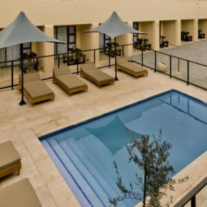 An overhead view of a swimming pool in a building at Clanwilliam Hotel in Clanwilliam
