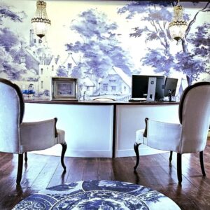 Two chairs in front of a desk with a computer at De Kloof Heritage Estate and Wellness in Swellendam