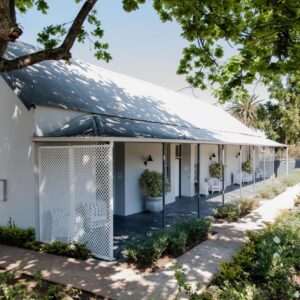 A white house with a metal roof at Elianthe Boutique Guesthouse in Swellendam