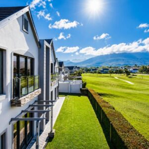 A house with a view of a golf course at Fairway Retreat Kingswood Golf Estate in George