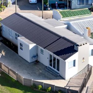 An overhead view of a house with white roofs at Family Retreat Near Diaz Beach and Park in Mossel Bay