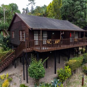A wooden chalet on stilts at Gooderson Knysna Chalets in Knysna