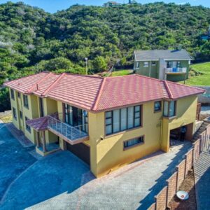 An aerial view of a house with a swimming pool at Hopslot Villa in Mossel Bay