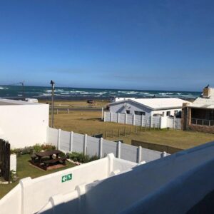 A view of the ocean from the balcony of a house at House of 2 Oceans in Agulhas