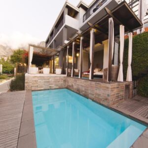 A swimming pool in front of a house at Kensington Place in Cape Town