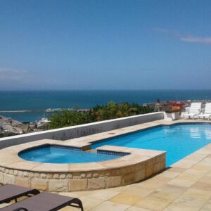 A swimming pool on the roof of a building at Lavandula Manor Self-Catering in Mossel Bay