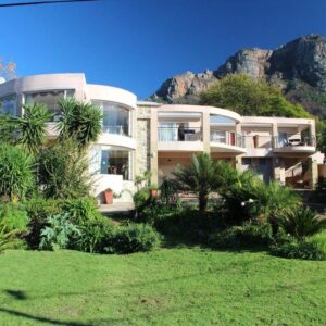 The guest house in its garden below the mountains at Lumley's Place Guesthouse in Stellenbosch