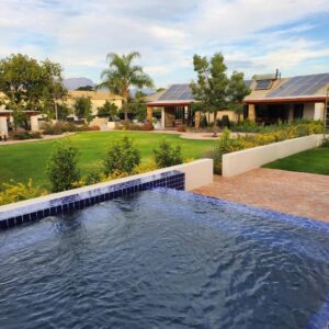 A swimming pool in the backyard of a house at Ochre and Ash in Clanwilliam