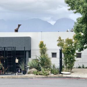 A white building with plants in front of it at Paarl Views in Paarl