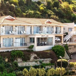 A house on the side of a hill at Phoenix Lodge and Waterside Accommodation in Knysna