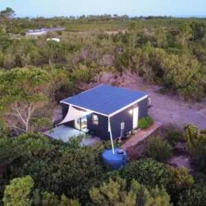 An aerial view of a small off-grid cabin in coastal fynbos at Plett Pods Casetta del Acqua in Plettenberg Bay