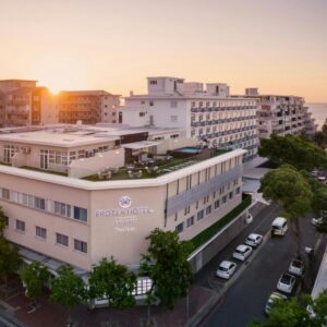 An aerial view of a city with a building at Protea Hotel by Marriott Cape Town Sea Point in Cape Town