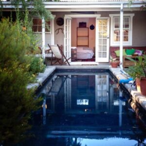 A plunge pool in front of a covered veranda at Rhus Cottage in Stanford