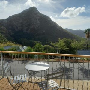 A balcony with a view of a mountain at Stonebrook Apartments in Simonʼs Town