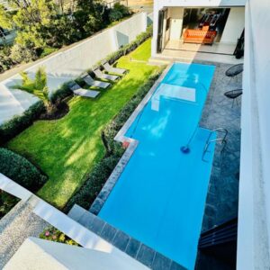 An overhead view of a swimming pool in a backyard at The Cliff Villa Boutique Guesthouse in Hermanus