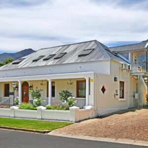 A house with solar panels on the roof at The Coach House in Franschhoek
