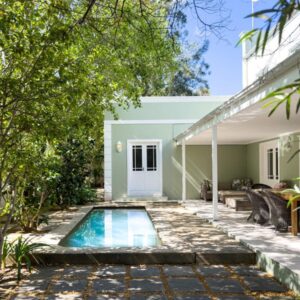 A plunge pool beside the house and covered patio at The hidden Retreat on Haumann in Franschhoek