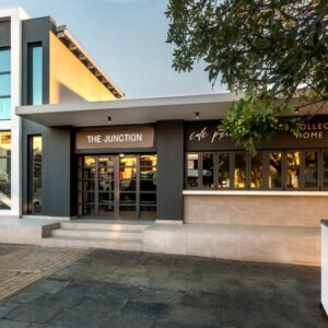 A store front of a building with windows at The Junction Boutique Hotel in Plettenberg Bay