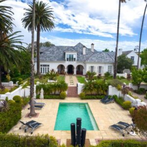 An aerial view of a house with a swimming pool at Wild Mushroom Country House in Stellenbosch