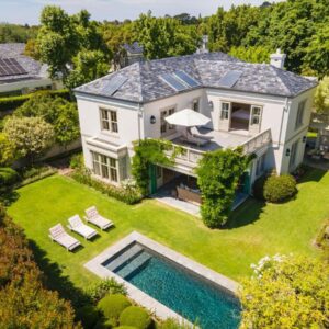 An aerial view of a house with a swimming pool at Villa High Court in Cape Town