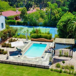 An aerial view of a swimming pool in a yard at Vine Guesthouse in Stellenbosch