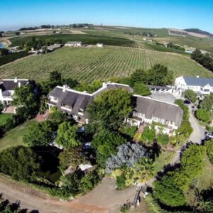 An aerial view of a house on a hill at Wedgeview Country House & Spa in Stellenbosch