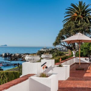 A view of the ocean from the balcony of a house at Whale View Manor & Spa in Simonʼs Town