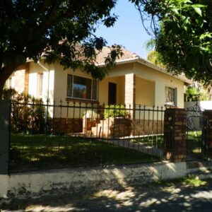 10 on Fairview B&B: a fence in front of a house