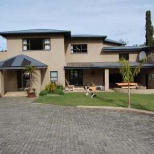 15 Witpeer Street Guesthouse: a house with a brick driveway in front of it
