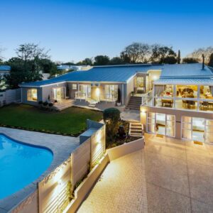 17 On Cedar Boutique Guesthouse: an aerial view of a house with a swimming pool