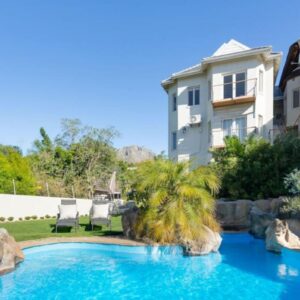 4 Piet Retief: a swimming pool in the backyard of a house
