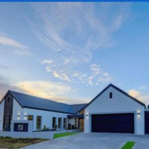 8 Guildford: a large white house with a garage
